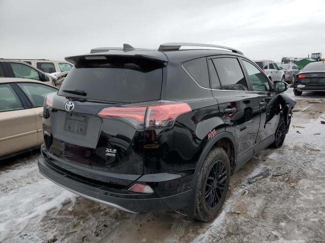Photo 3 from auction – 2017 TOYOTA RAV4 XLE with VIN 2T3RFREVXHW657488