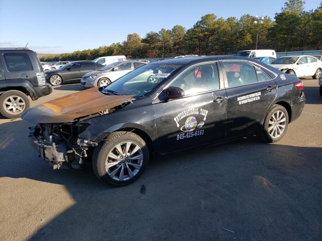 TOYOTA CAMRY LE 2016 with VIN 4T4BF1FK0GR530852 - Photo from auction