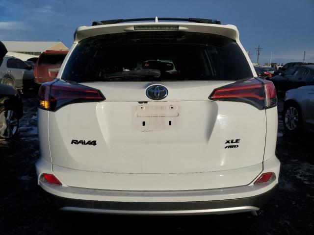 Photo 6 from auction – 2016 TOYOTA RAV4 XLE with VIN 2T3RFREV1GW522091
