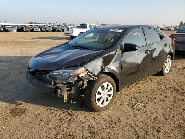 TOYOTA COROLLA L 2017 with VIN 5YFBURHE5HP695871 - Photo from auction