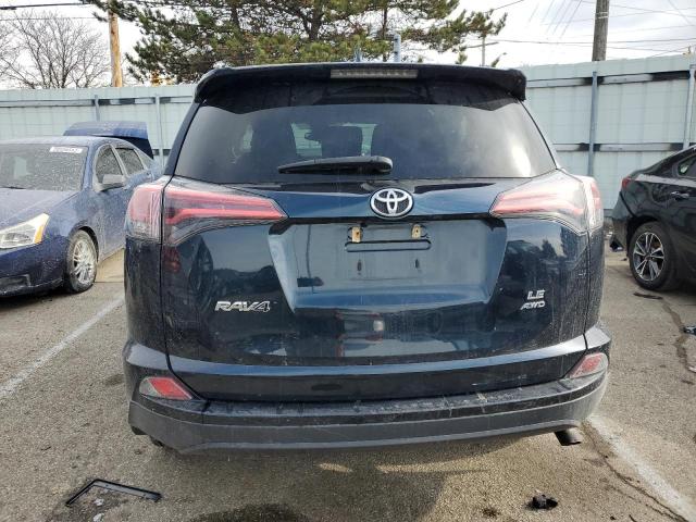 Photo 6 from auction – 2018 TOYOTA RAV4 LE with VIN 2T3BFREV2JW725693