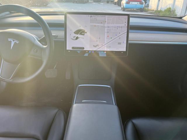 Photo 9 from auction – 2021 TESLA MODEL 3 with VIN 5YJ3E1EA4MF085762