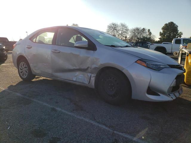 Photo 4 from auction – 2018 TOYOTA COROLLA L with VIN 5YFBURHEXJP828257