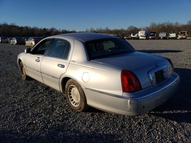 Photo 2 from auction – 2002 LINCOLN TOWN CAR E with VIN 1LNHM81W12Y653266