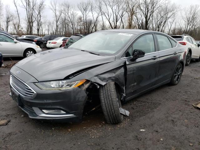 FORD FUSION SE 2018 with VIN 3FA6P0LUXJR128399 - Photo from auction