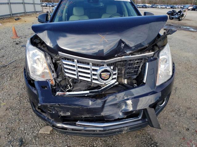 Photo 12 from auction – 2014 CADILLAC SRX PERFOR with VIN 3GYFNCE37ES585038