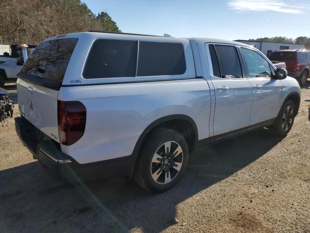 Photo 3 from auction – 2020 HONDA RIDGELINE with VIN 5FPYK3F59LB025669