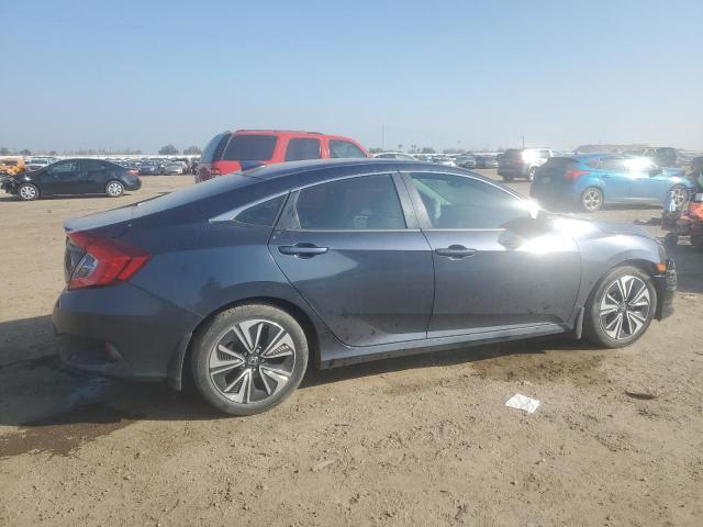 Photo 3 from auction – 2017 HONDA CIVIC EXL with VIN 2HGFC1F73HH640966