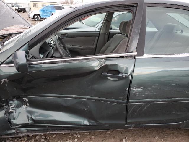 Photo 7 from auction – 2002 TOYOTA CAMRY LE with VIN JTDBE32K820052473