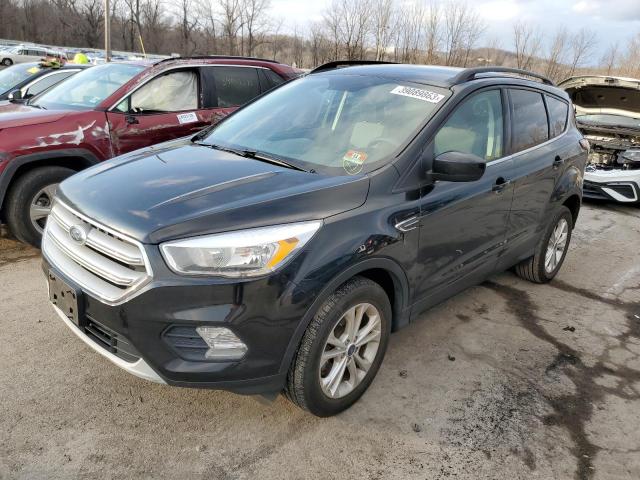 FORD ESCAPE SE 2018 with VIN 1FMCU9GDXJUA58654 - Photo from auction