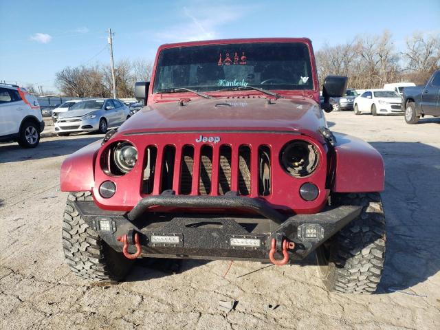 Photo 5 from auction – 2011 JEEP WRANGLER U with VIN 1J4BA5H10BL577669