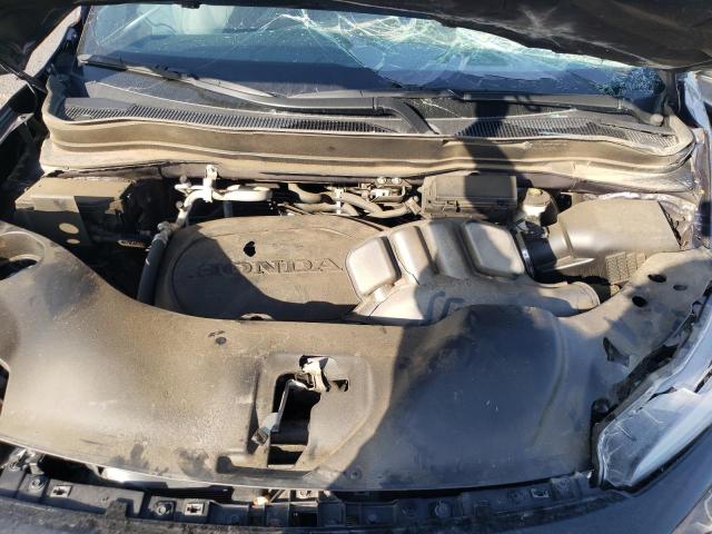 Photo 12 from auction – 2021 HONDA PASSPORT E with VIN 5FNYF7H56MB012073
