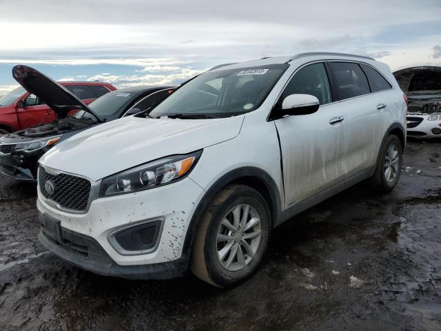 KIA SORENTO LX 2018 with VIN 5XYPGDA32JG429260 - Photo from auction