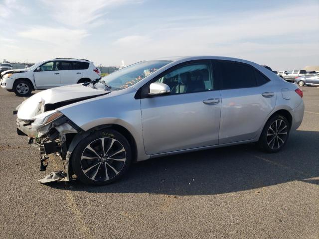 TOYOTA COROLLA L 2018 with VIN 5YFBURHE0JP750605 - Photo from auction