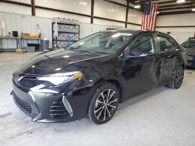 TOYOTA COROLLA L 2018 with VIN 5YFBURHE3JP820985 - Photo from auction