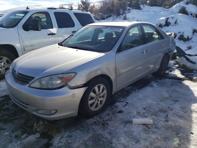 TOYOTA CAMRY LE 2003 with VIN 4T1BE30K03U225816 - Photo from auction