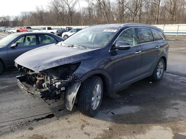 KIA SORENTO LX 2016 with VIN 5XYPGDA50GG009099 - Photo from auction