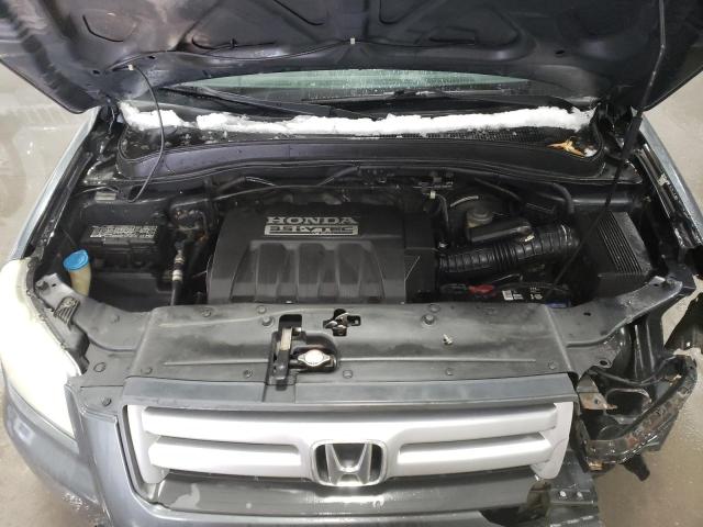 Photo 12 from auction – 2006 HONDA PILOT LX with VIN 5FNYF28166B026624