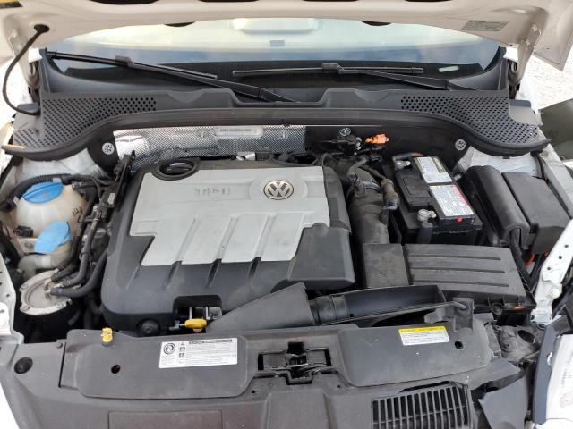 Photo 11 from auction – 2014 VOLKSWAGEN BEETLE with VIN 3VW5L7ATXEM807903