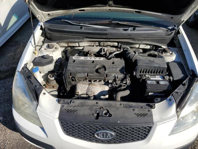 Photo 11 from auction – 2009 KIA RIO BASE with VIN KNADE223496578230
