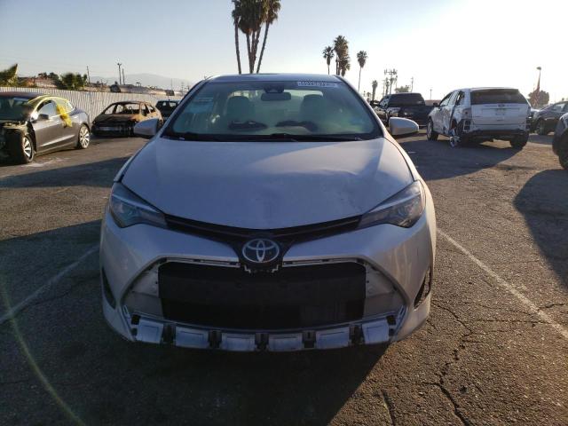 Photo 5 from auction – 2018 TOYOTA COROLLA L with VIN 5YFBURHEXJP828257