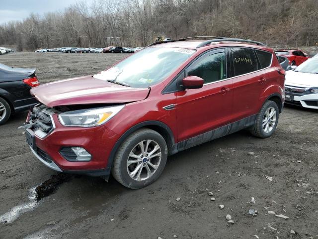 FORD ESCAPE SE 2018 with VIN 1FMCU9GD9JUA93640 - Photo from auction