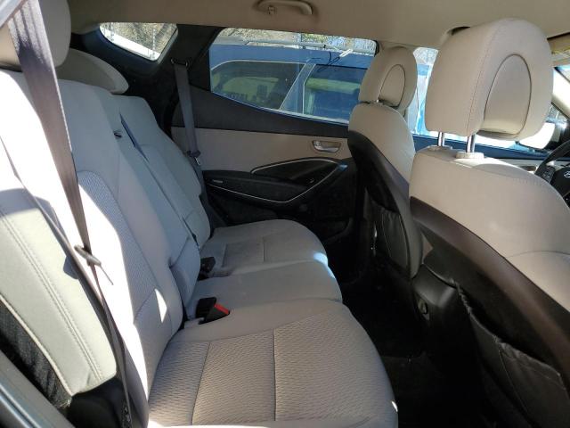 Photo 11 from auction – 2017 HYUNDAI SANTA FE S with VIN 5NMZU3LB0HH010159