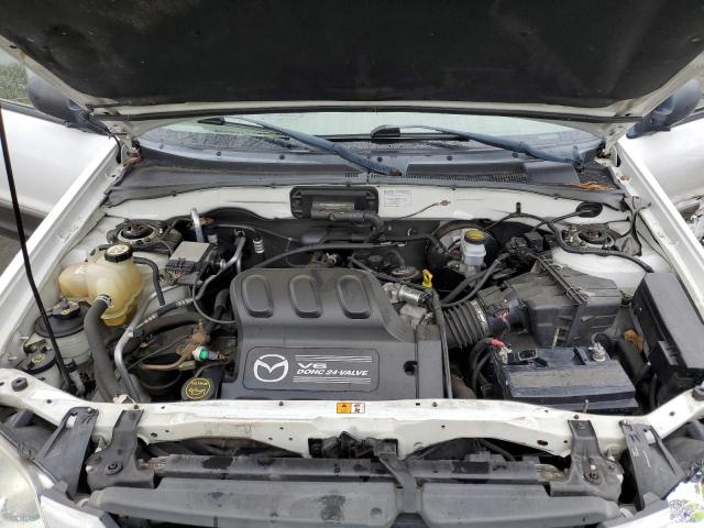 Photo 12 from auction – 2002 MAZDA TRIBUTE LX with VIN 4F2YU08142KM57471