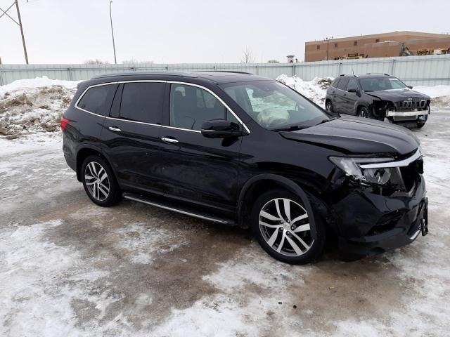 Photo 4 from auction – 2016 HONDA PILOT ELIT with VIN 5FNYF6H09GB072514