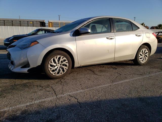 TOYOTA COROLLA L 2018 with VIN 5YFBURHEXJP828257 - Photo from auction