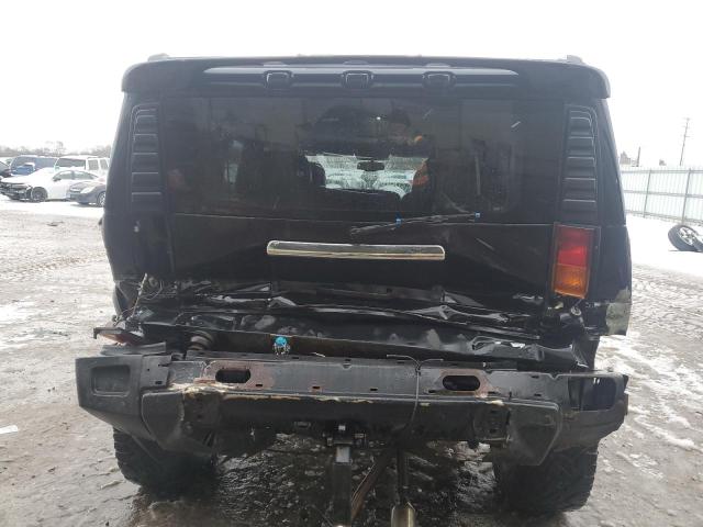 Photo 6 from auction – 2003 HUMMER H2 with VIN 5GRGN23U83H144703