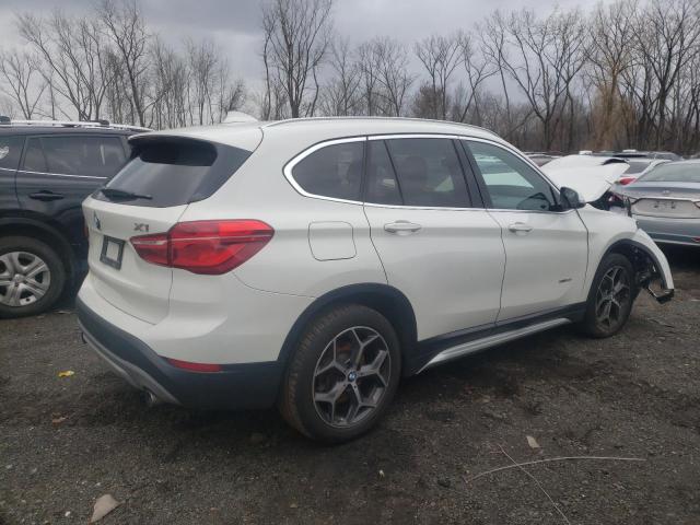 Photo 3 from auction – 2017 BMW X1 XDRIVE2 with VIN WBXHT3Z35H4A55966
