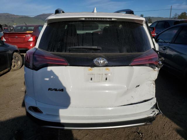 Photo 6 from auction – 2018 TOYOTA RAV4 SE with VIN JTMNFREV0JJ188785