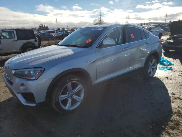 BMW X4 XDRIVE2 2015 with VIN 5UXXW3C57F0M86965 - Photo from auction