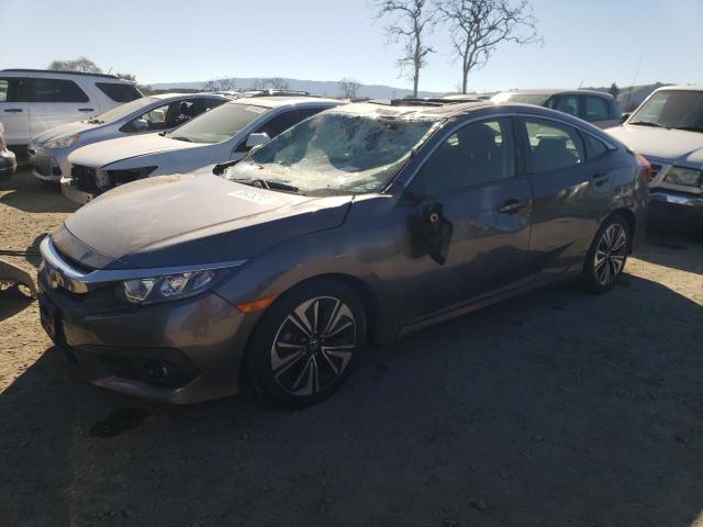HONDA CIVIC EX 2018 with VIN JHMFC1F37JX012873 - Photo from auction
