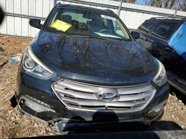 Photo 5 from auction – 2017 HYUNDAI SANTA FE S with VIN 5NMZU3LB0HH010159