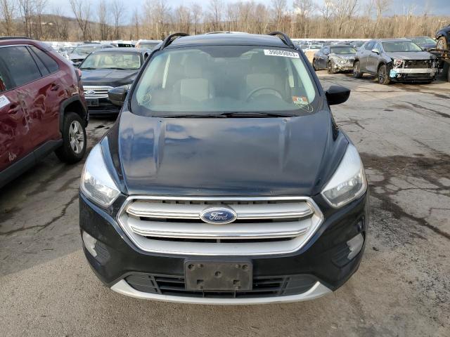 Photo 5 from auction – 2018 FORD ESCAPE SE with VIN 1FMCU9GDXJUA58654