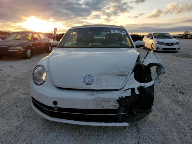 Photo 5 from auction – 2014 VOLKSWAGEN BEETLE with VIN 3VW5L7ATXEM807903