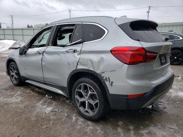 Photo 2 from auction – 2018 BMW X1 XDRIVE2 with VIN WBXHT3Z38J4A65929