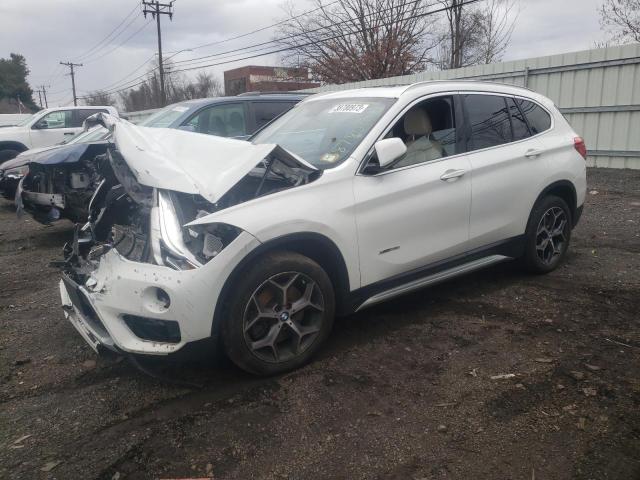 BMW X1 XDRIVE2 2017 with VIN WBXHT3Z35H4A55966 - Photo from auction