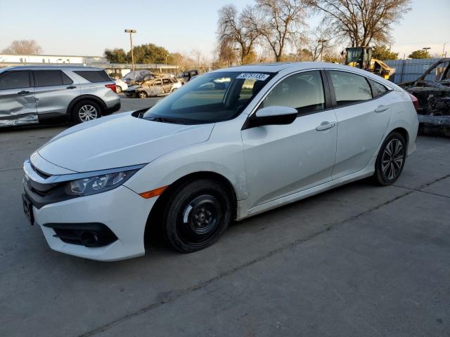 HONDA CIVIC EX 2018 with VIN JHMFC1F33JX004043 - Photo from auction