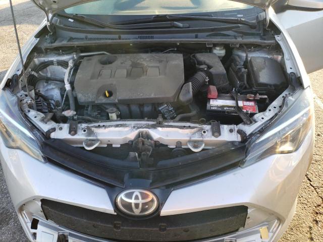 Photo 11 from auction – 2018 TOYOTA COROLLA L with VIN 5YFBURHEXJP828257