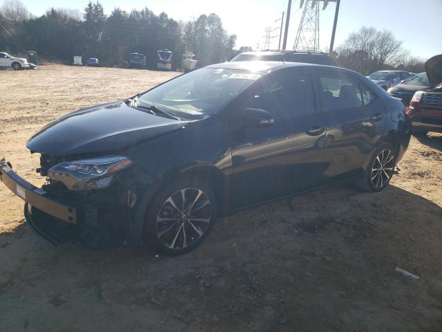 TOYOTA COROLLA L 2017 with VIN 2T1BURHE7HC869665 - Photo from auction