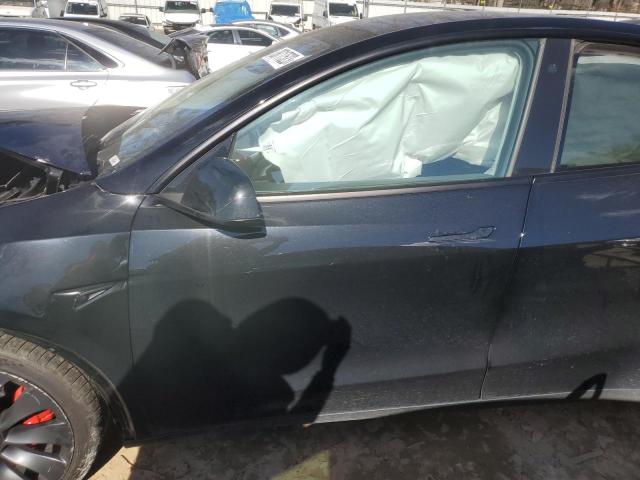 Photo 7 from auction – 2022 TESLA MODEL Y with VIN 7SAYGDEF9NF414439