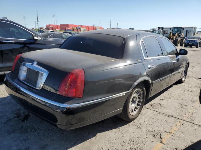 Photo 3 from auction – 2002 LINCOLN TOWN CAR C with VIN 1LNHM85W82Y604060