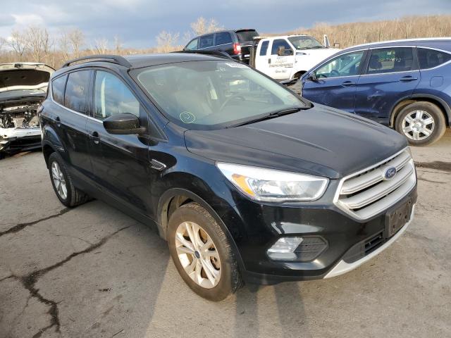 Photo 4 from auction – 2018 FORD ESCAPE SE with VIN 1FMCU9GDXJUA58654