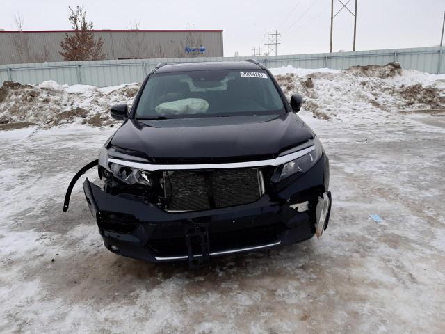 Photo 5 from auction – 2016 HONDA PILOT ELIT with VIN 5FNYF6H09GB072514