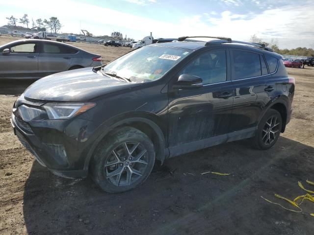 TOYOTA RAV4 SE 2018 with VIN 2T3JFREV0JW706491 - Photo from auction