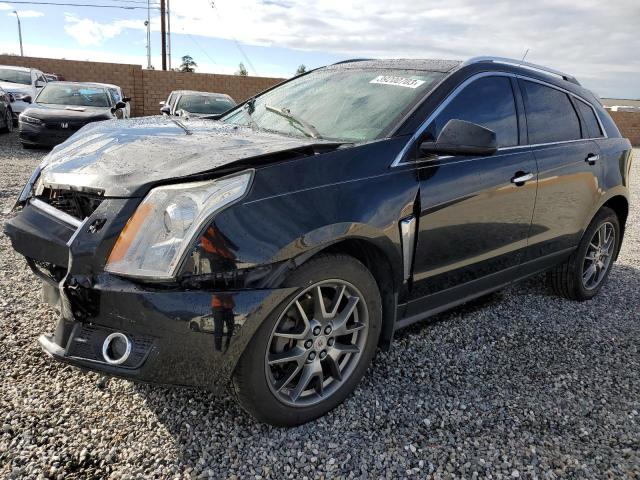 CADILLAC SRX PREMIU 2014 with VIN 3GYFNGE36ES546545 - Photo from auction