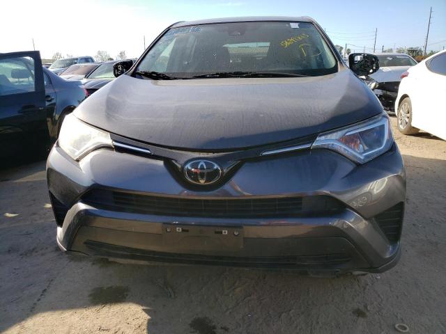 Photo 5 from auction – 2018 TOYOTA RAV4 LE with VIN JTMBFREV1JJ211316